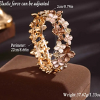 💖 Bracelet Floral Doré Élastique avec Écrin Transparent – Élégance et Douceur Féminine - AM ASSYREM